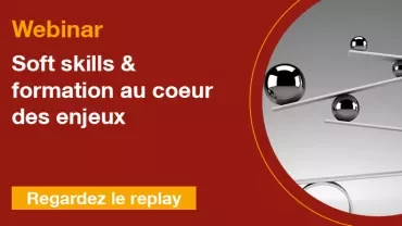 Webinar sur les compétences humaines, image d'équilibre avec des sphères métalliques.