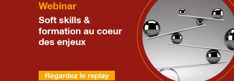 Webinar sur les compétences humaines, image d'équilibre avec des sphères métalliques.